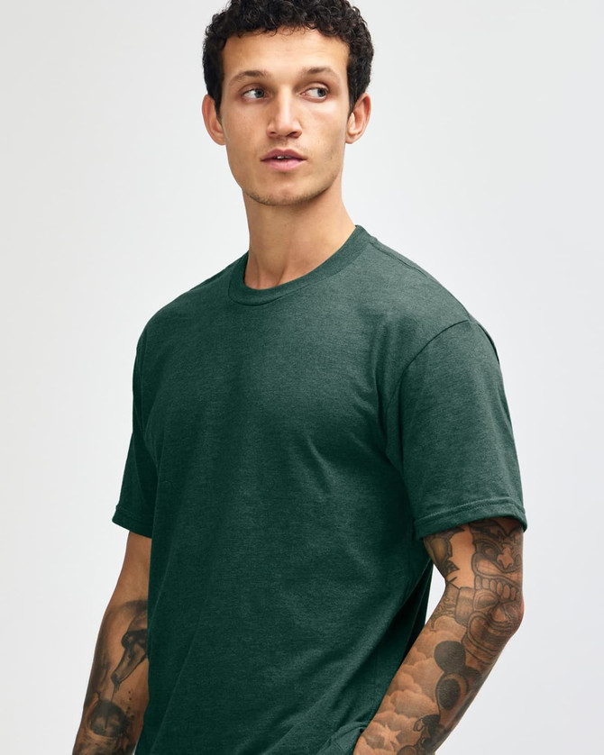 A unisex CVC short sleeve t-shirt in dark green, featuring a simple design and a branding logo.