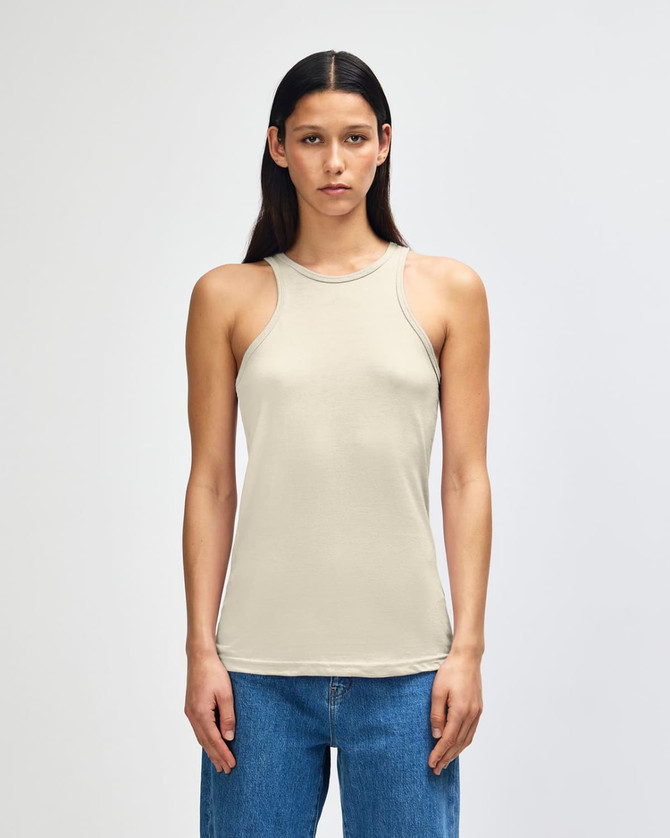 A lightweight, cream-coloured women's racerneck tank top with a fitted design and branding.