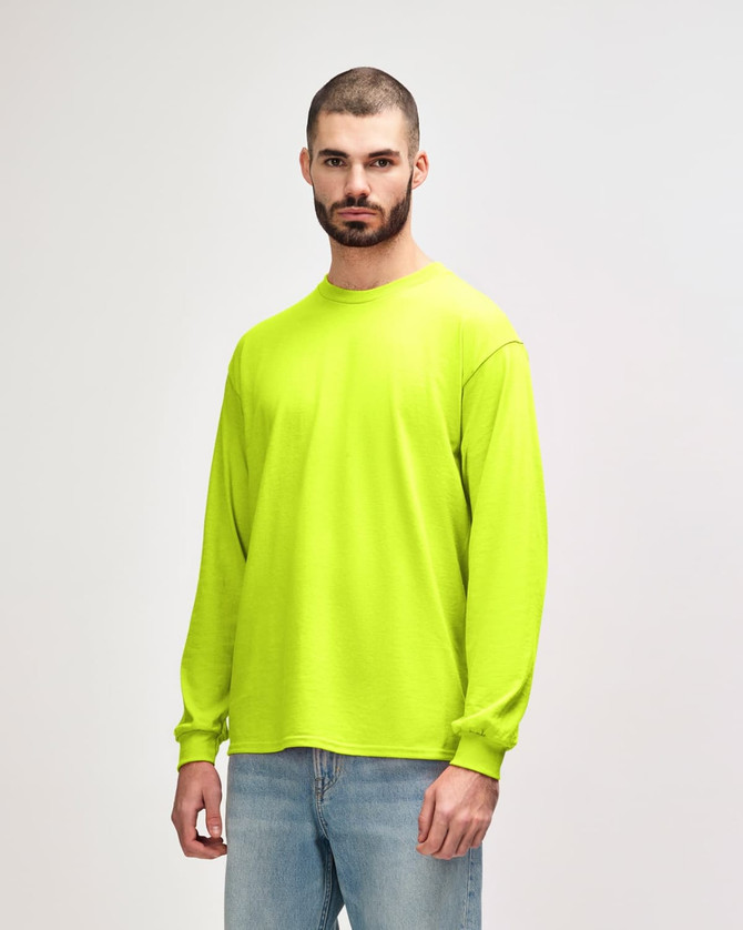 A bright yellow long sleeve T-shirt displayed on a model. The shirt features a logo or branding.