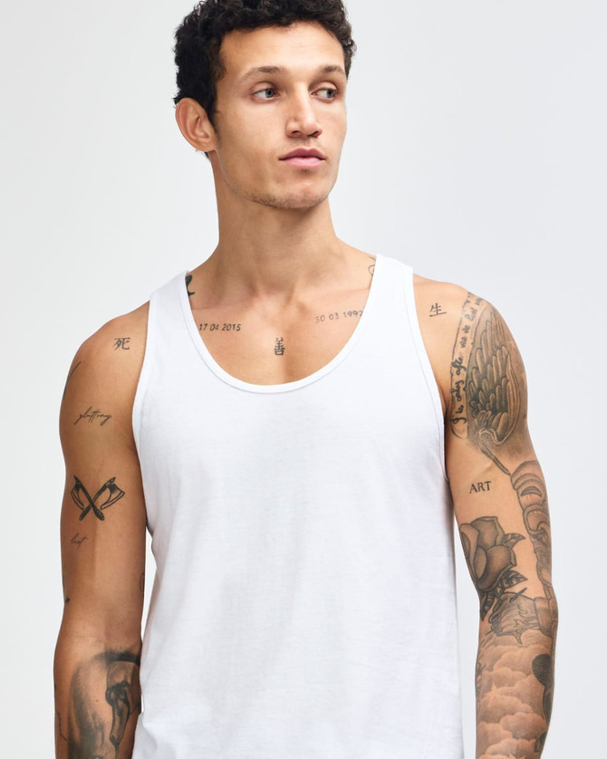 A unisex fine jersey tank top in white, featuring a simple design and no visible logos.
