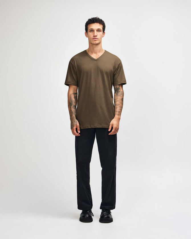 A unisex olive green V-neck T-shirt displayed on a model, featuring short sleeves and a logo.