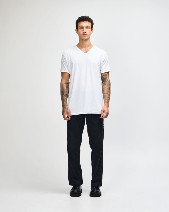 A white unisex V-neck T-shirt displayed on a model, featuring short sleeves and a logo.