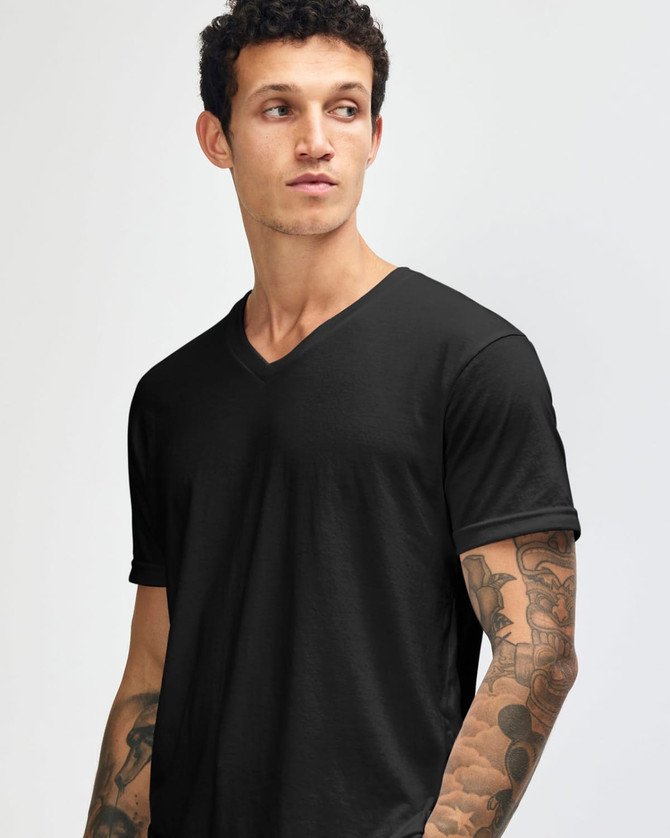 A black unisex V-neck T-shirt displayed on a model, featuring short sleeves and a simple design.