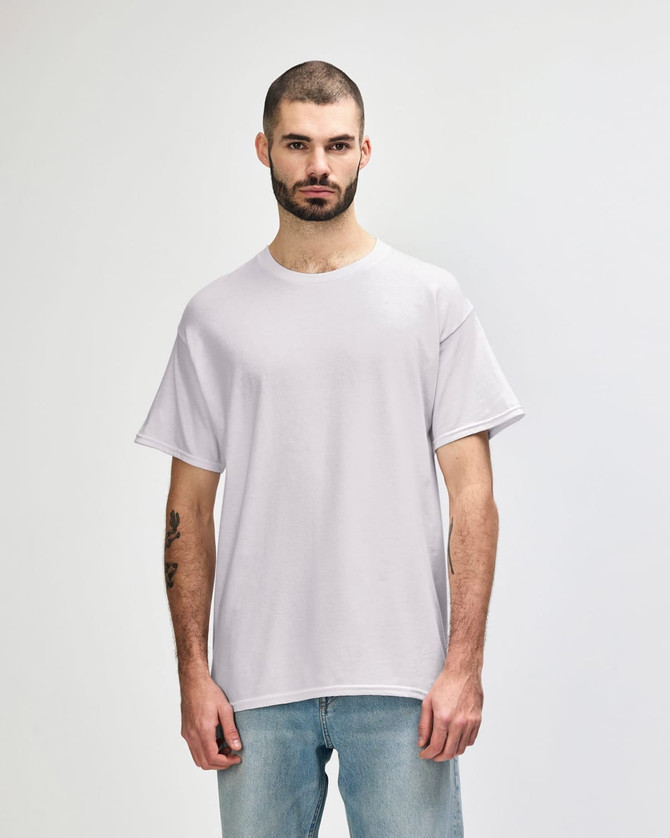 A light grey adult t-shirt displayed on a model, featuring a simple design and a branding logo.