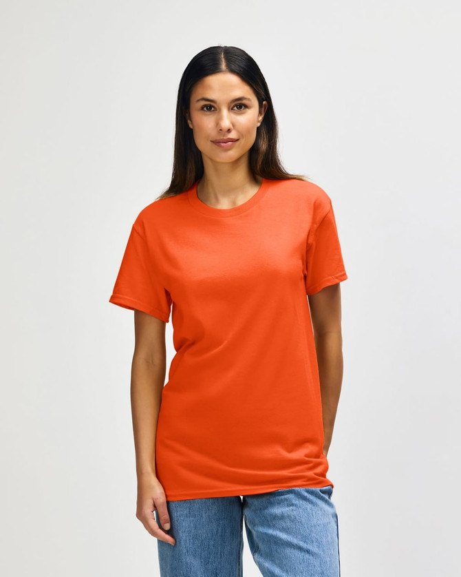 An orange Gildan Heavy Cotton adult T-shirt displayed on a male model against a plain background.