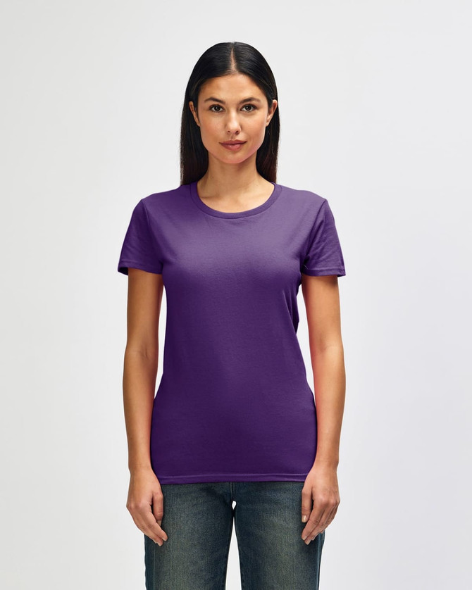 A purple Gildan Heavy Cotton Ladies' T-Shirt is displayed on a model, featuring short sleeves and a round neckline.