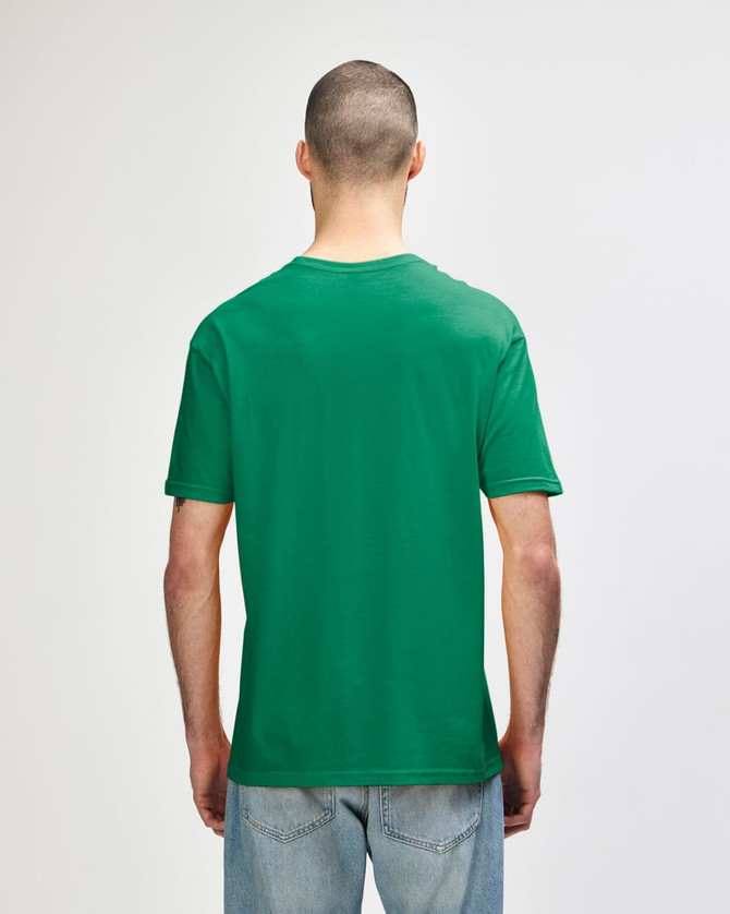 A green Gildan Softstyle adult T-shirt displayed on a person from the back, featuring a plain design.