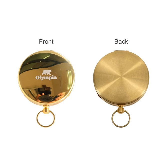 A gold pocket watch with a smooth finish, featuring a logo on the front and a plain back.