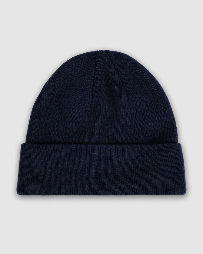 A navy blue watch cap featuring a folded cuff and a textured knit design. It includes a logo.