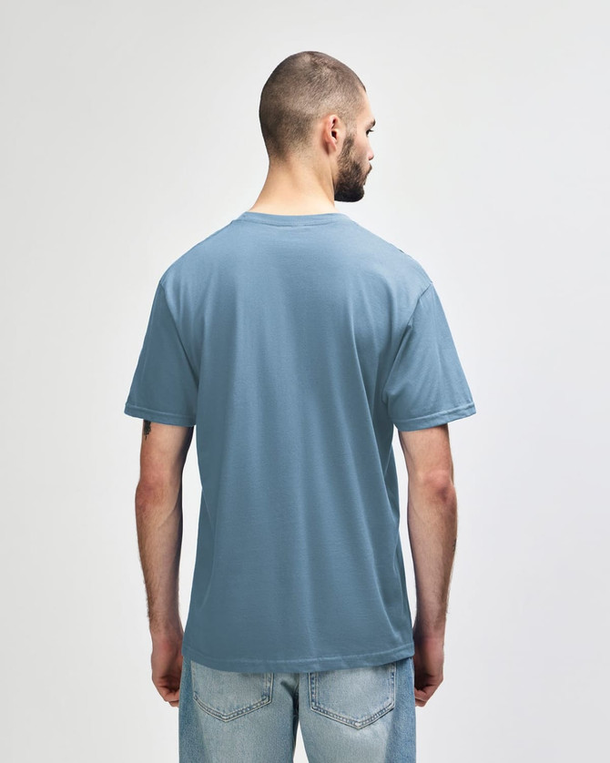 A softstyle adult midweight t-shirt in blue with yellow side panels, featuring a logo on the back.