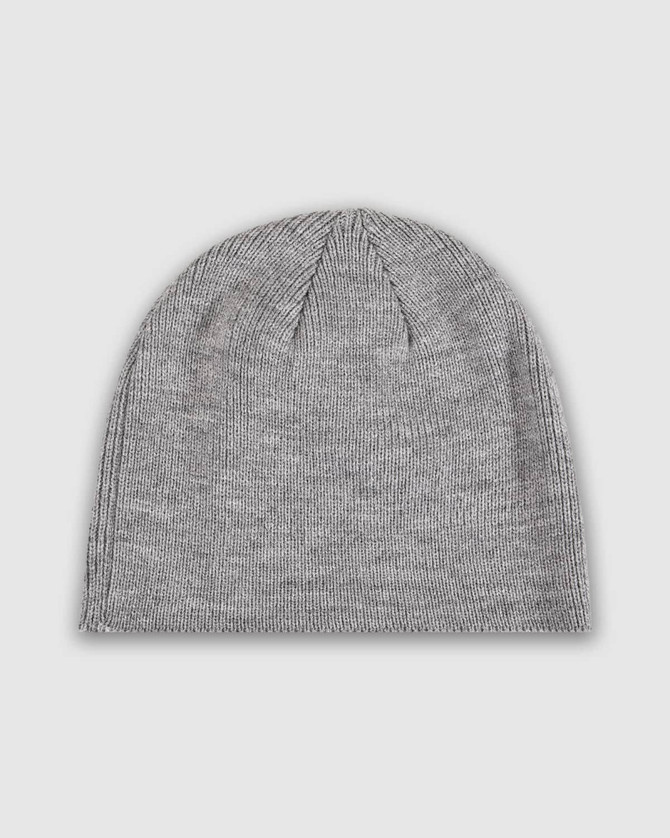 A black knit beanie made from a soft fabric, featuring a simple design and a small logo.