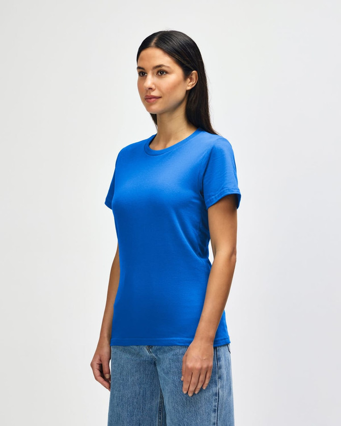 A blue midweight ladies' T-shirt featuring a round neckline and short sleeves, displayed by a smiling model.