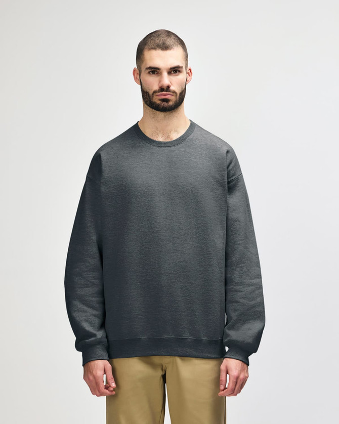 A green sweatshirt is displayed, featuring a classic crew neck and ribbed cuffs, with a logo on the front.