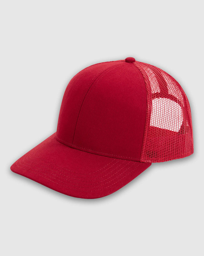 A red trucker cap featuring a structured front and mesh back, with a logo on the front.