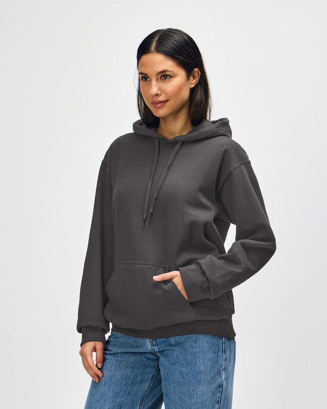 A hooded sweatshirt in olive green, featuring a front pocket and a drawstring hood. The model is wearing blue jeans.