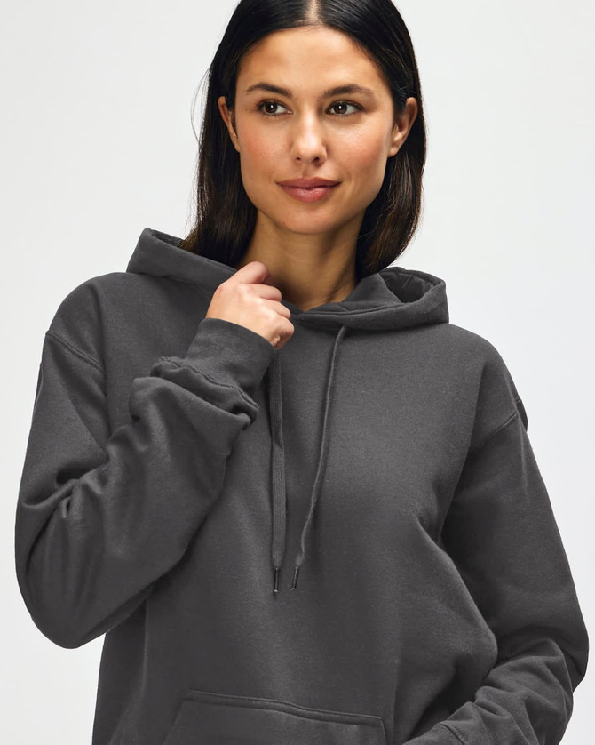 A hooded sweatshirt in earthy green, featuring a drawstring hood and a plain design. It includes a logo.