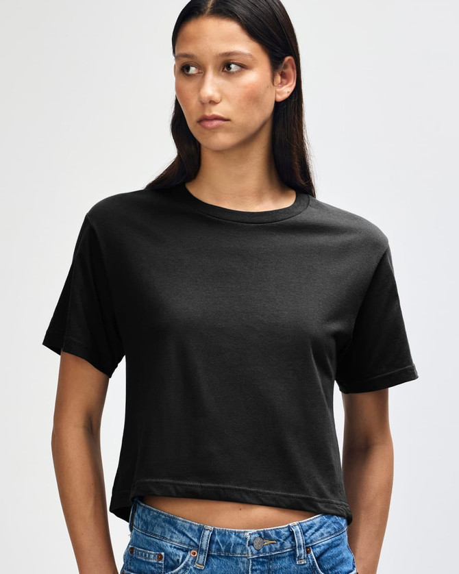 A black women's fine jersey boxy T-shirt with a relaxed fit, featuring a round neckline and short sleeves.