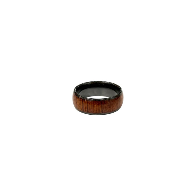 A NFC ceramic ring featuring a polished black interior and a rich brown wooden exterior. It has a logo visible.