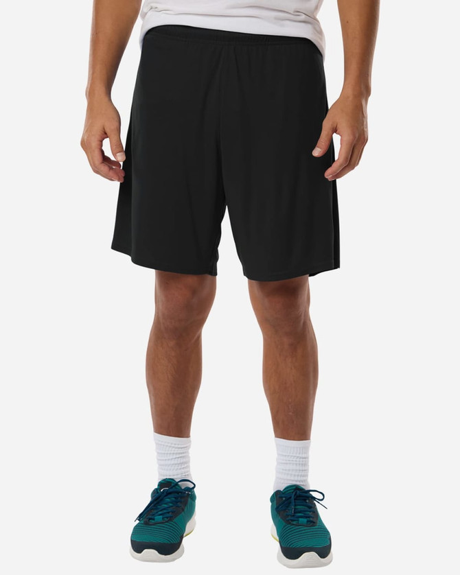 Black performance shorts with an elastic waistband, worn by a model standing with hands at their sides.