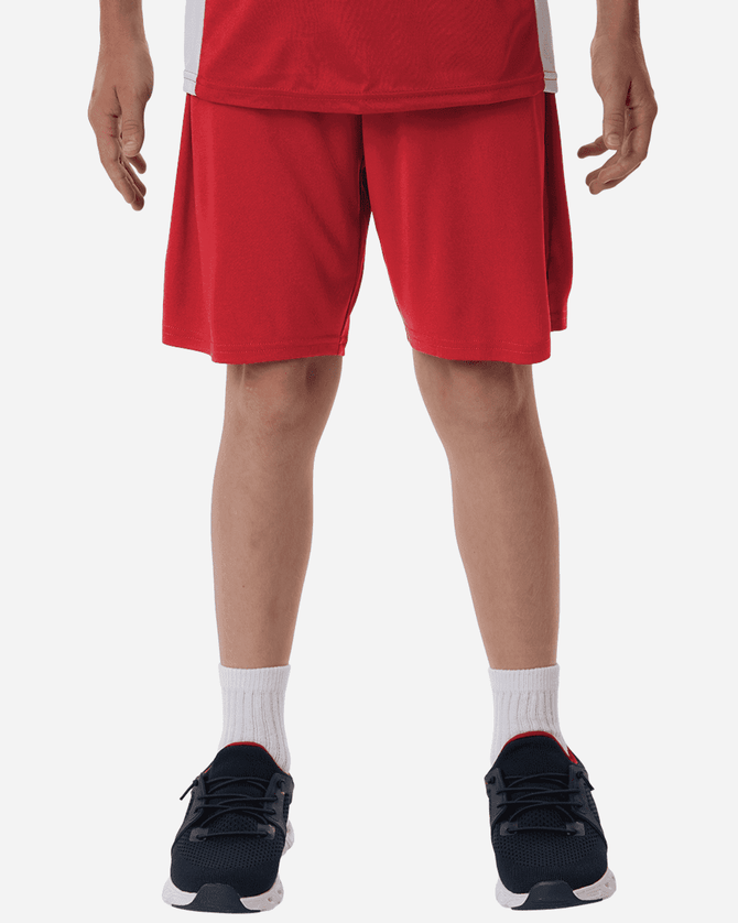 A red pair of athletic shorts worn by a person, featuring an elastic waistband and no visible logos.