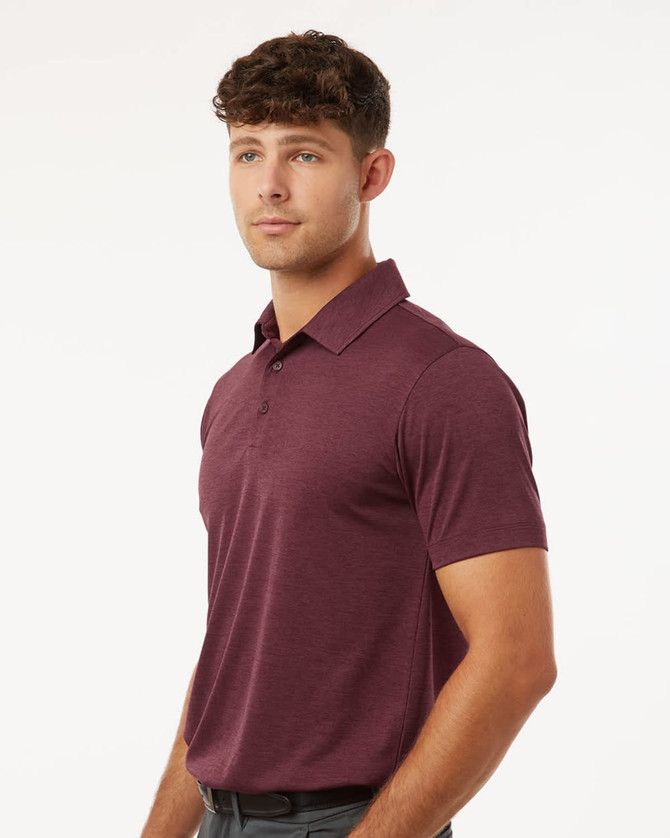 A maroon men's polo shirt with short sleeves and a collar, featuring a logo on the chest.