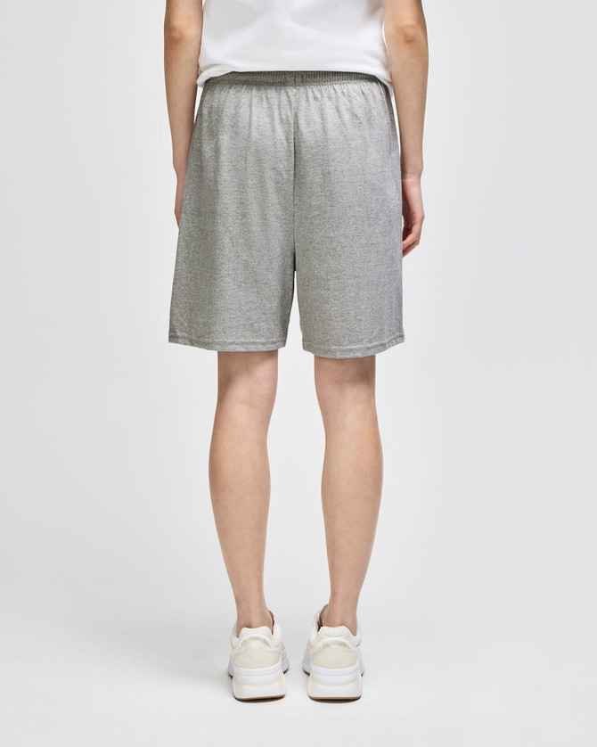 Grey cotton gym shorts with an elastic waistband and a logo, viewed from the back.