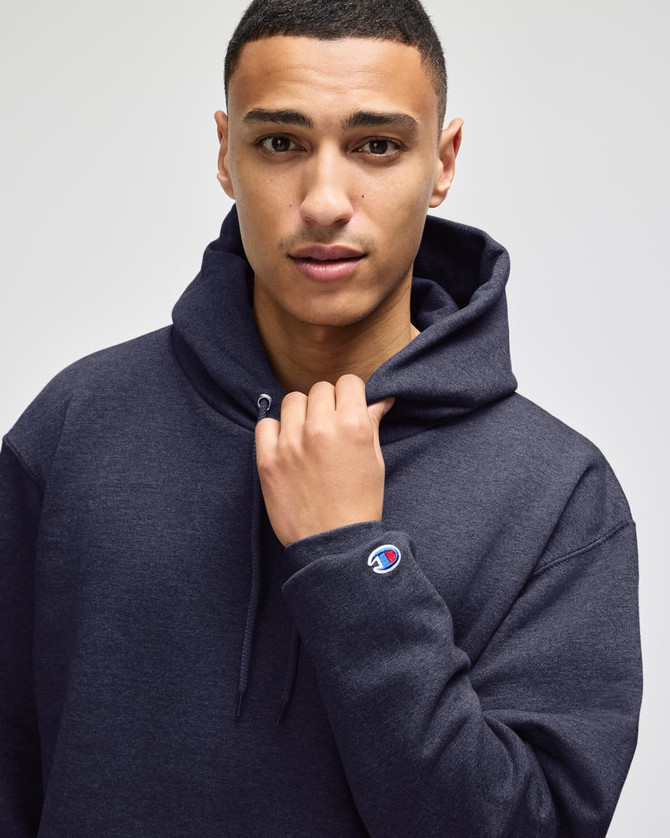 A dark navy adult crewneck sweatshirt is featured, with a hood and a logo on the sleeve.