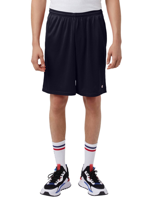 Navy sports shorts with pockets, featuring an elastic waistband and a logo on the side. Suitable for various activities.