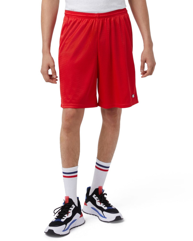 Red mesh sports shorts with pockets, featuring an elastic waistband, worn with sporty socks and shoes.