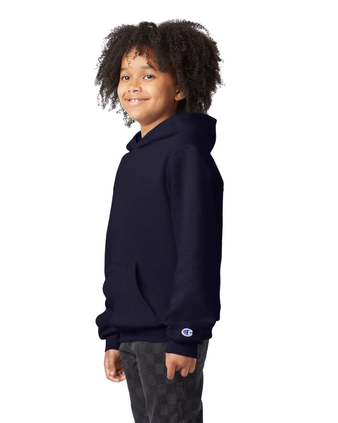 A navy blue youth pullover hooded sweatshirt with a logo on the sleeve. The model has curly hair and smiles.