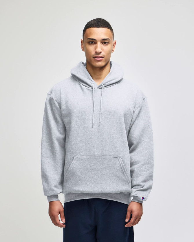 A grey pullover hooded sweatshirt with a front pocket and a logo on the sleeve.