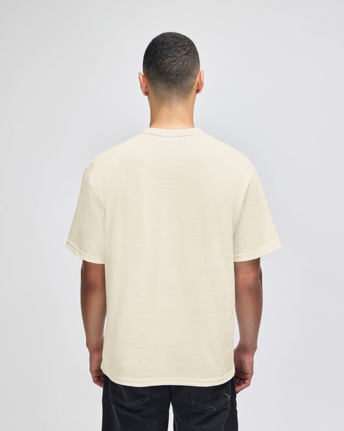 A beige Champion Adult Heritage Jersey T-Shirt viewed from the back, featuring short sleeves and a logo.