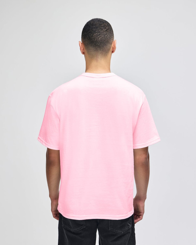 A pink Champion adult heritage jersey t-shirt displayed from the back view on a male model.
