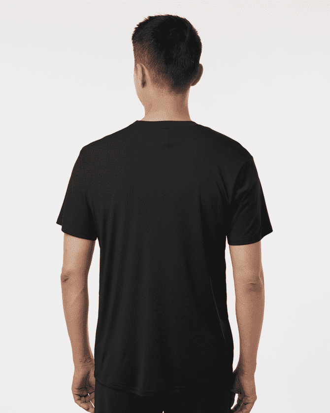A black men's performance t-shirt viewed from the back, featuring a simple cut and a discreet logo.
