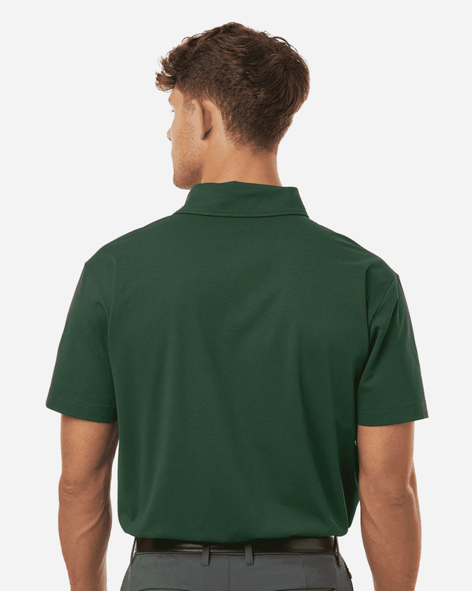 A green men's polo shirt with a collar, featuring a logo on the back.