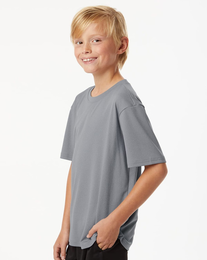 A grey youth T-shirt with short sleeves, featuring a pocket and a logo.