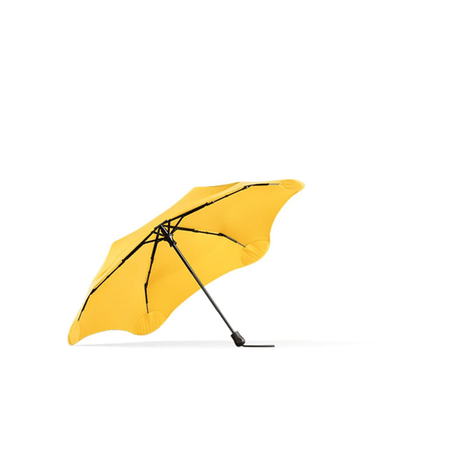 A yellow umbrella with a black frame, featuring a unique, modern design and a sturdy structure.