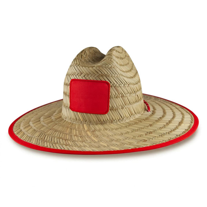 A straw hat with a wide brim, featuring a red trim and a square patch on the crown.