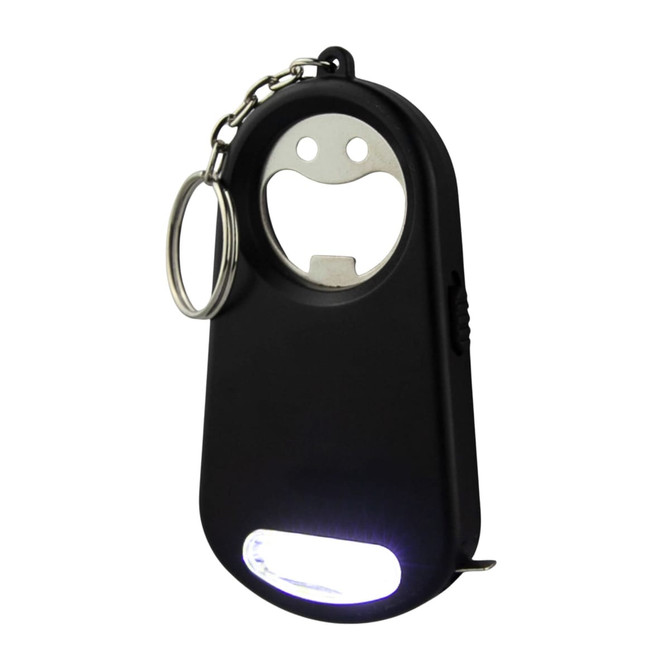 A drink bottle opener key ring in black with a smiling face design and an integrated torch feature.
