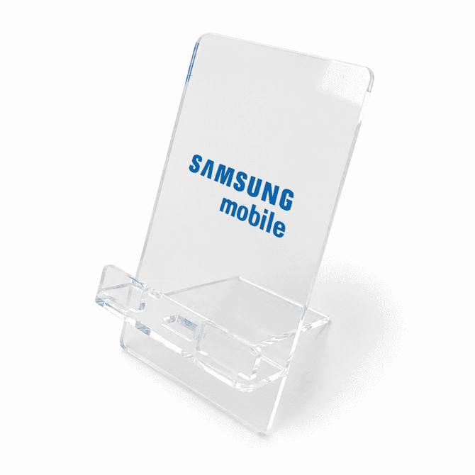 A clear acrylic phone stand with a tilted design, featuring a logo on the front.