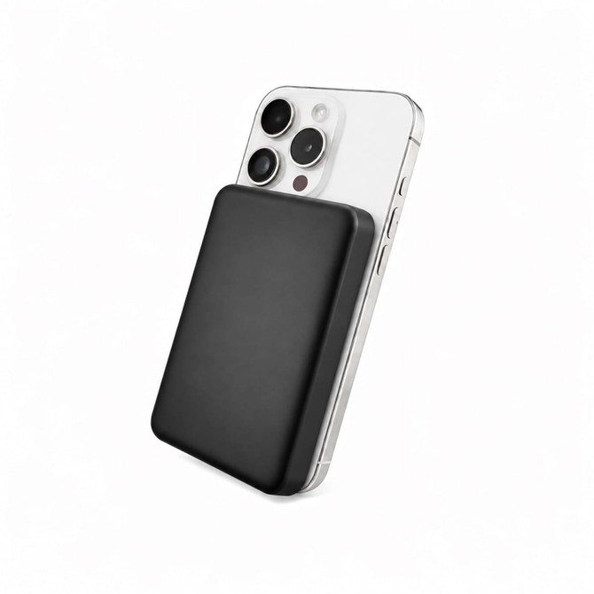 A black power bank is attached to the back of a smartphone, highlighting its sleek design. The product includes branding.