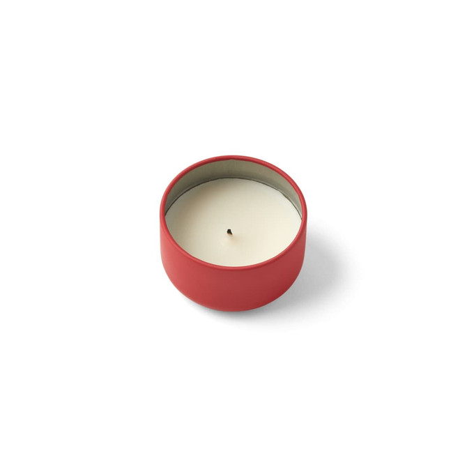 A red mini tin candle with a white wax interior and a single wick. The tin has a smooth finish and a minimalistic design.