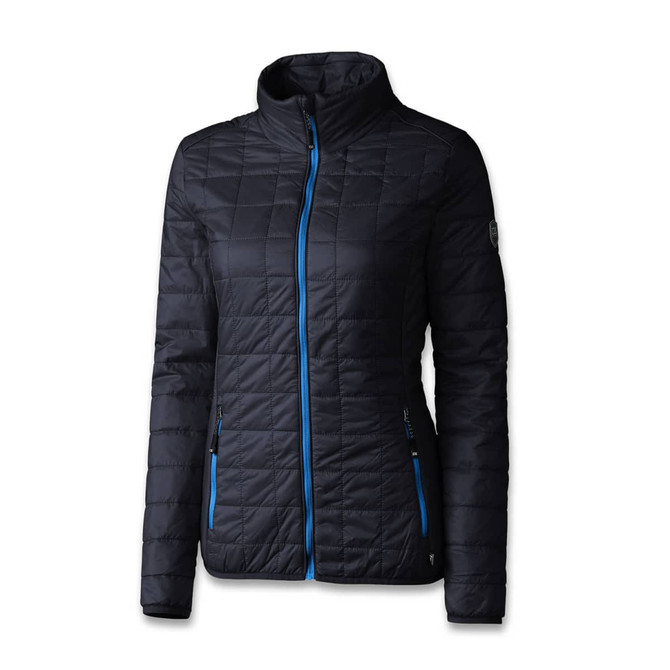 A women's jacket in navy blue with bright blue zippers and two side pockets. It features a logo on the sleeve.