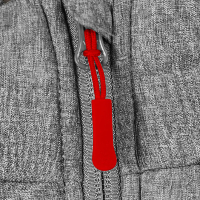 A grey puffer vest featuring a red zip pull and a textured fabric finish. Includes a logo on the design.
