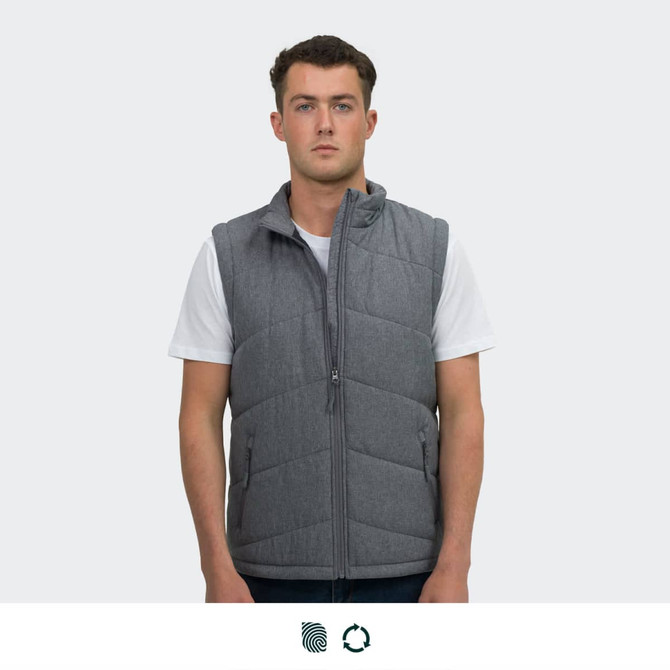 A grey puffer vest with a zip front and side pockets, worn by a model standing straight.