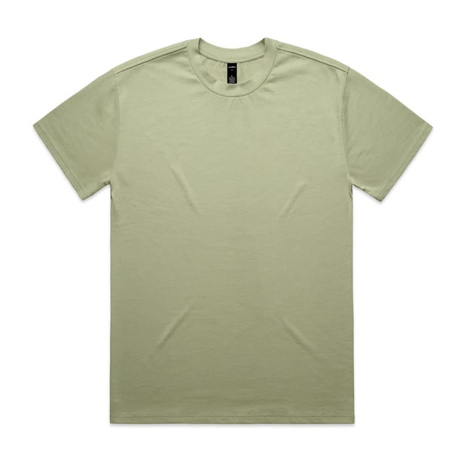 A light green Heavy Tee t-shirt with a round neckline and short sleeves, featuring a brand logo.