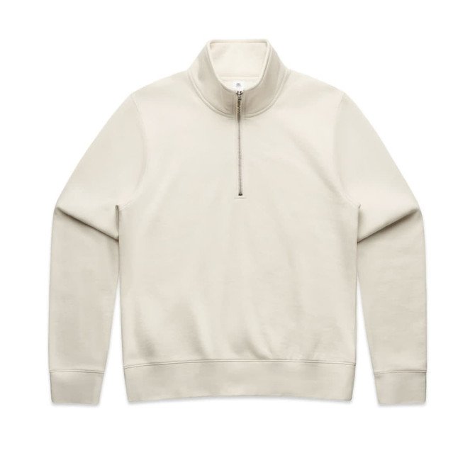 A cream half zip crew jumper with a smooth texture and long sleeves, featuring a logo on the front.