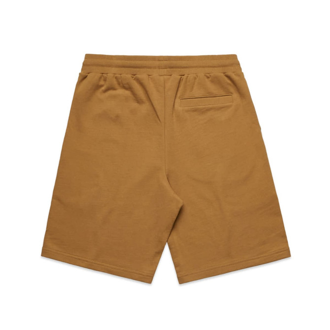 A pair of mustard-coloured sports shorts with an elastic waistband and a back pocket. Features a logo.