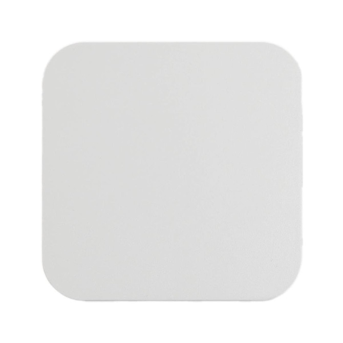 A square wireless charger in a smooth white finish.