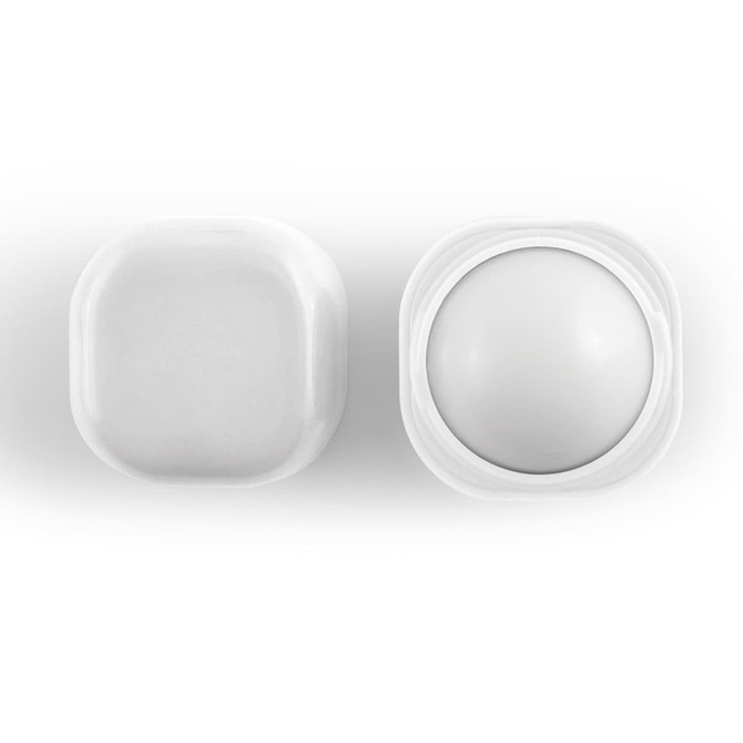 A cube-shaped lip balm container in white, featuring a rounded balm interior. The product has a simple design and includes branding.
